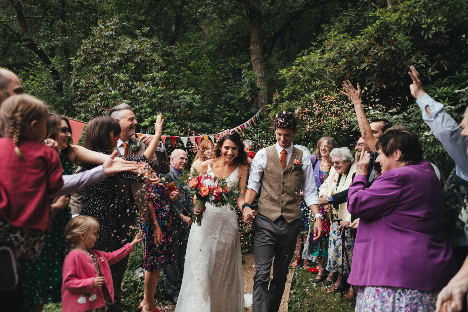 confetti, colourful wedding, festival wedding, Woodland Festival Wedding, woodland wedding photography, documentary wedding photography, wedding reportage, natural wedding, bride and groom