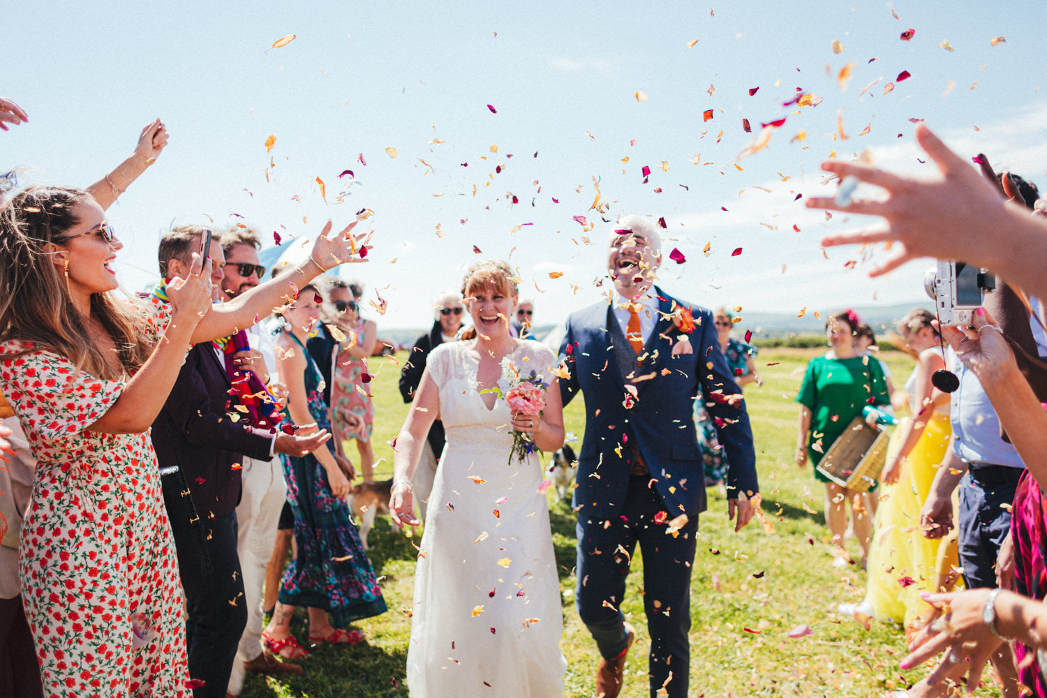 confetti, confetti line, bride & groom, festival style wedding, colourful wedding, festival wedding, Holsome Park Wedding Photography