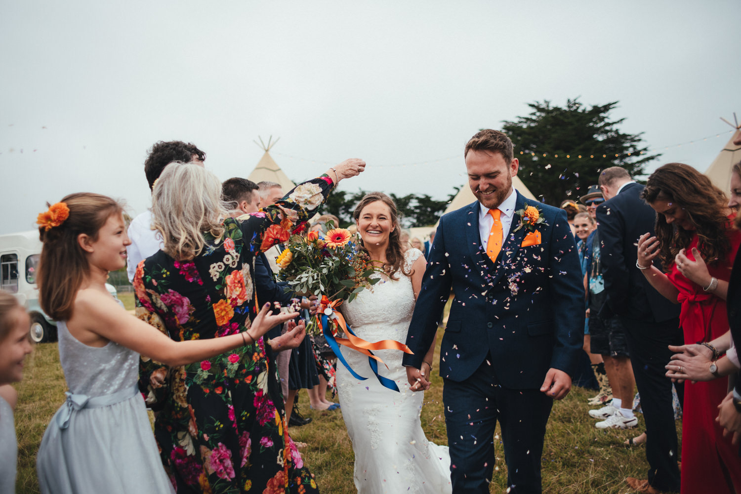 confetti, bride and groom, tipi wedding, sunset tipis, boho wedding, colourful styling, rock weddings, Rock Cornwall Wedding Photography