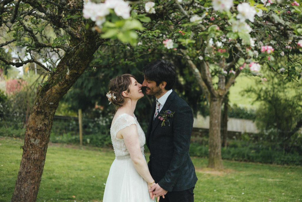 Bride and Groom, blossom trees, spring wedding